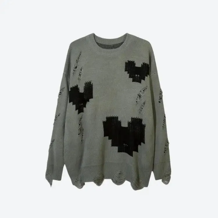 Grunge Sweater with Distressed Details and Contrast Color Heart Patterns